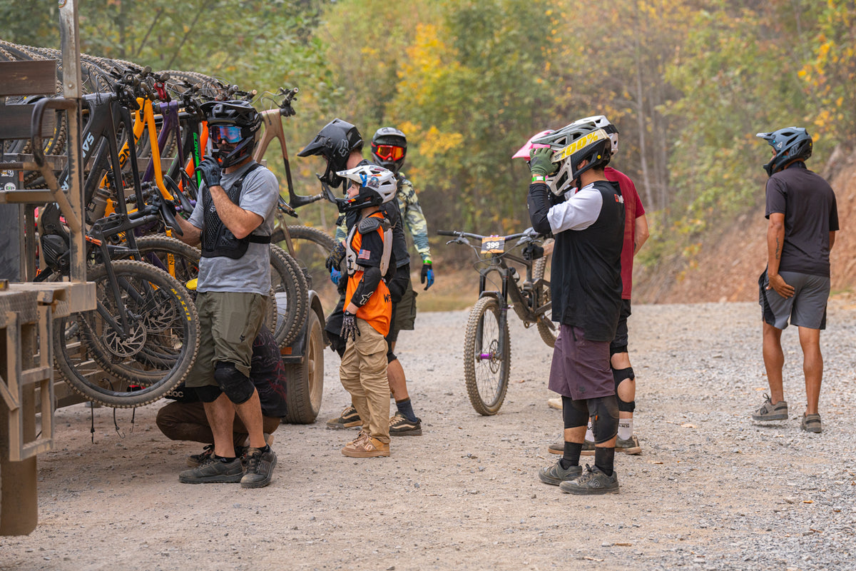 Young riders progressing on a jump trail